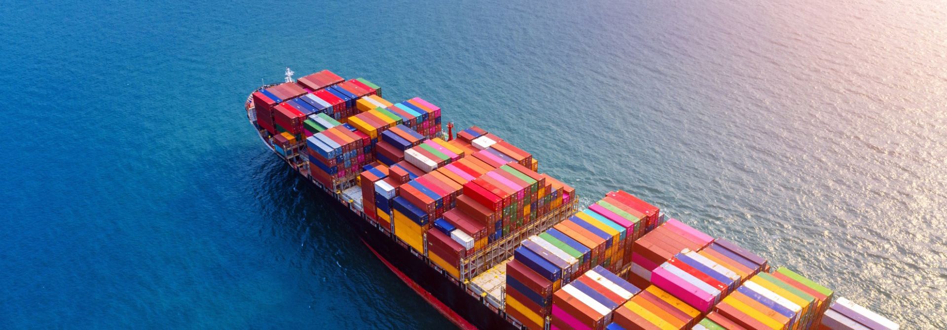 Colourful shipping containers on the water