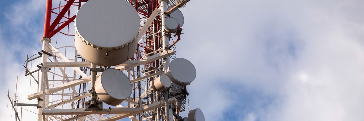 Close up shot of radio tower in sky